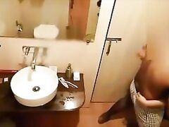 Desi beautiful couple making out in shower room.
