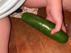 Emma being naughty with a cucumber