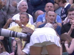Sweaty tennis babe bending over after match