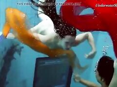 Two redheads swimming SUPER HOT!!!