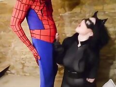 Busty Cosplay Catwoman takes spiderman web