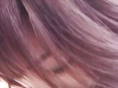 She gets stripped and pushed onto the bed while a man teases and bites down on her nipples.